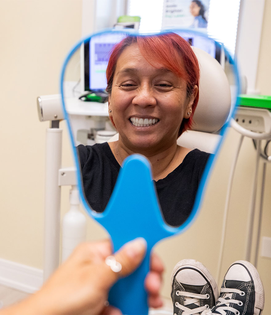 Patient happy after Teeth whitening procedure