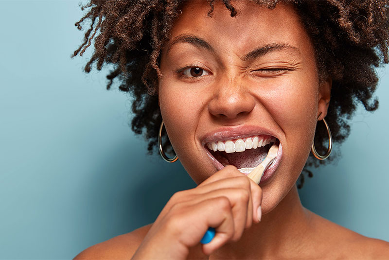 Patient brushing their teeth