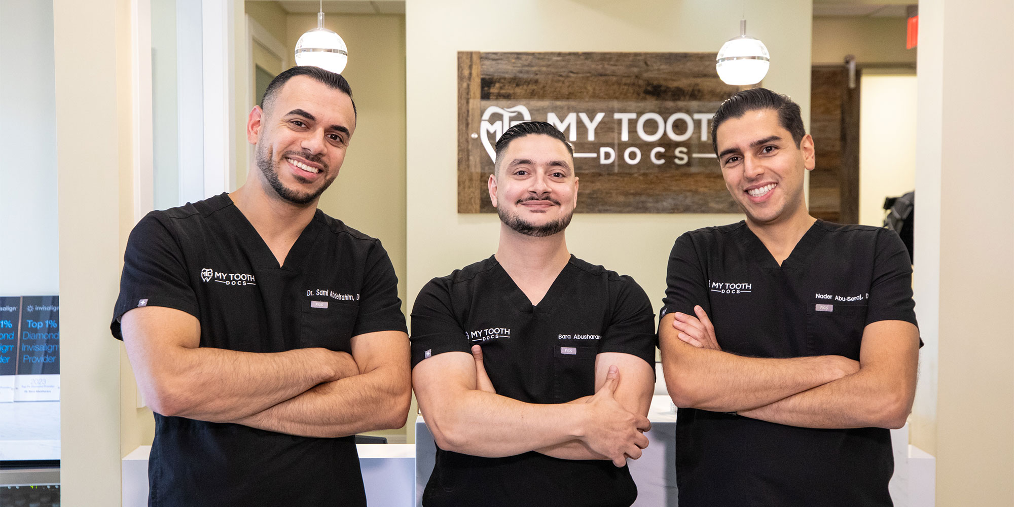 Dr. Bara Abusharara, Dr. Sami Abdelrahimand Dr. Nader Abu-Seraj standing next to each other smiling