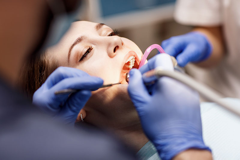 dentist going through procedure on a patient